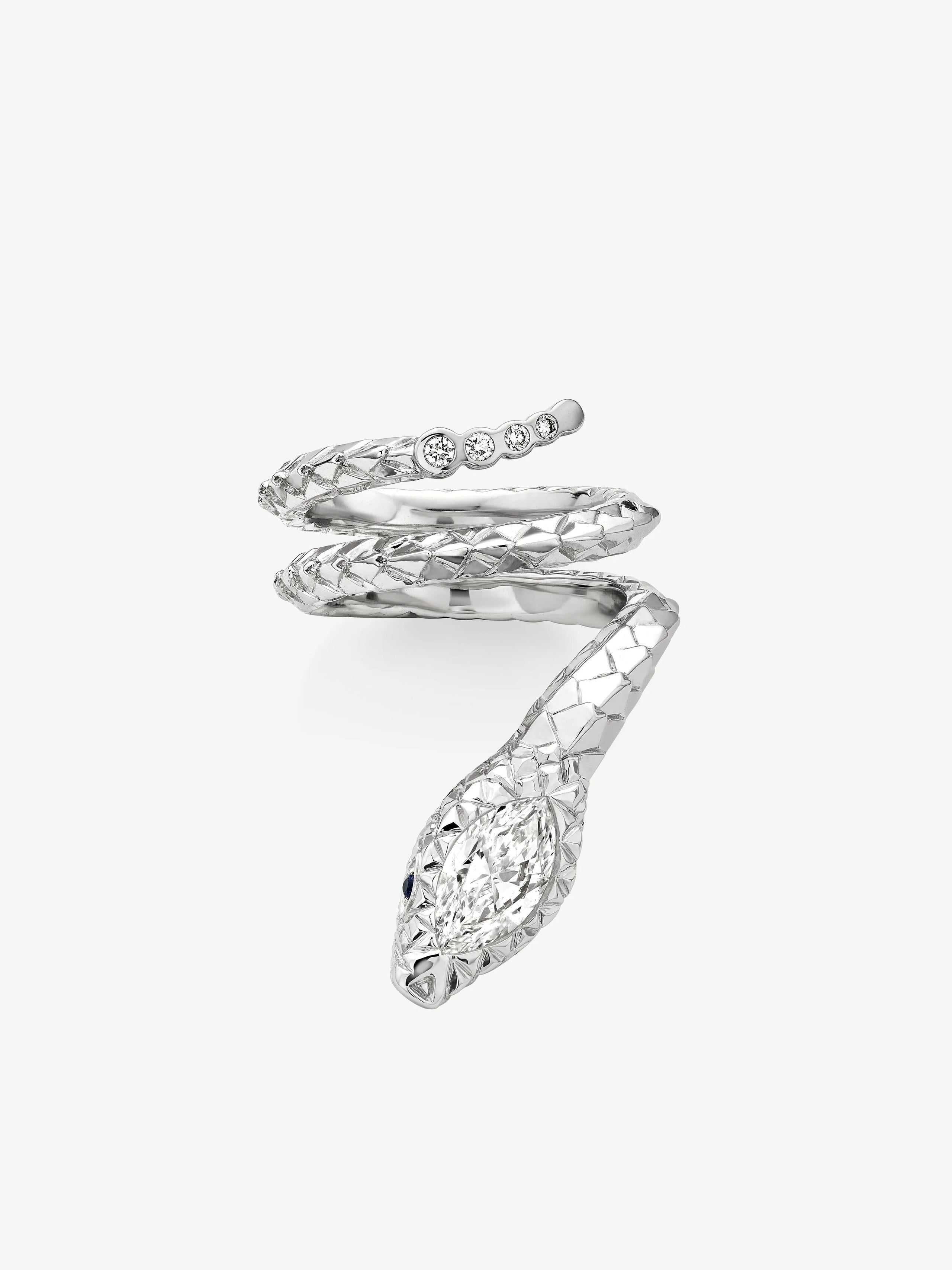 Silver snake-shaped ring with gemstones on a white background View 1
