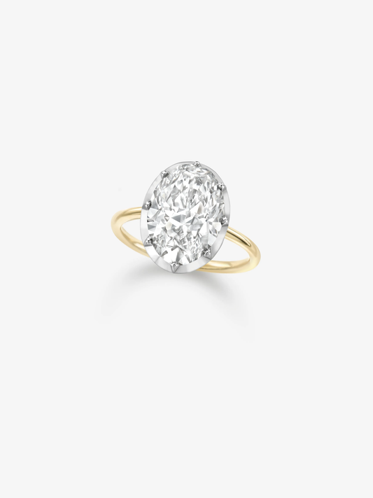 Oval diamond ring set in a delicate 18K yellow and white gold band, showcasing craftsmanship that blends antique elegance with contemporary design. View 2