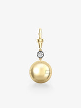Yellow gold sphere locket pendant featuring a bezel-set diamond, blending antique-inspired craftsmanship with contemporary minimalist design.