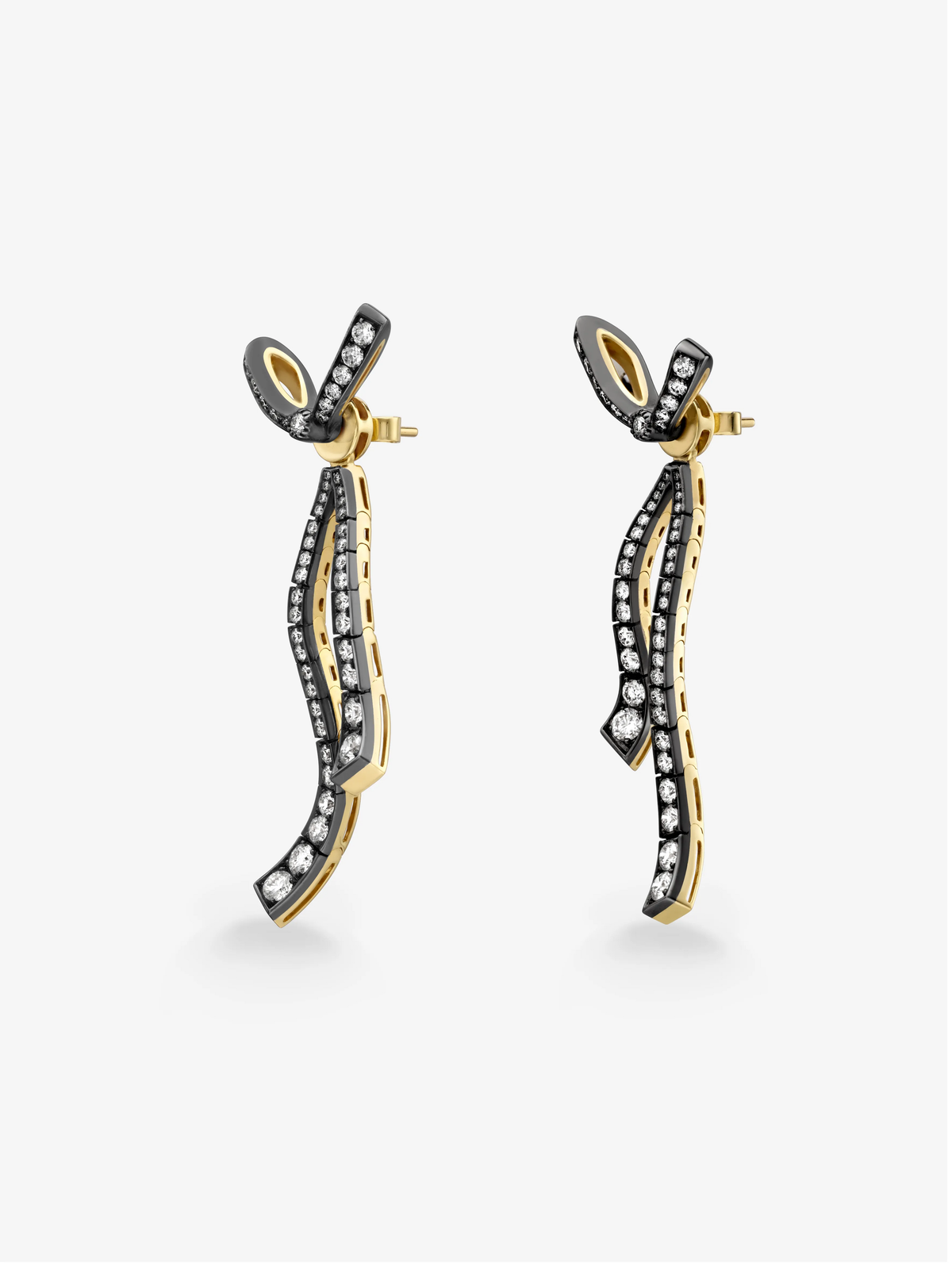 Jessica McCormack Bows diamond ribbon drop earrings in blackened and yellow gold, featuring curved diamond set ribbons and post backs View 4
