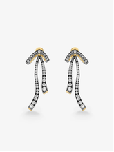 Jessica McCormack diamond bow and ribbon drop earrings in blackened gold with diamond set curved ribbons and yellow gold accents