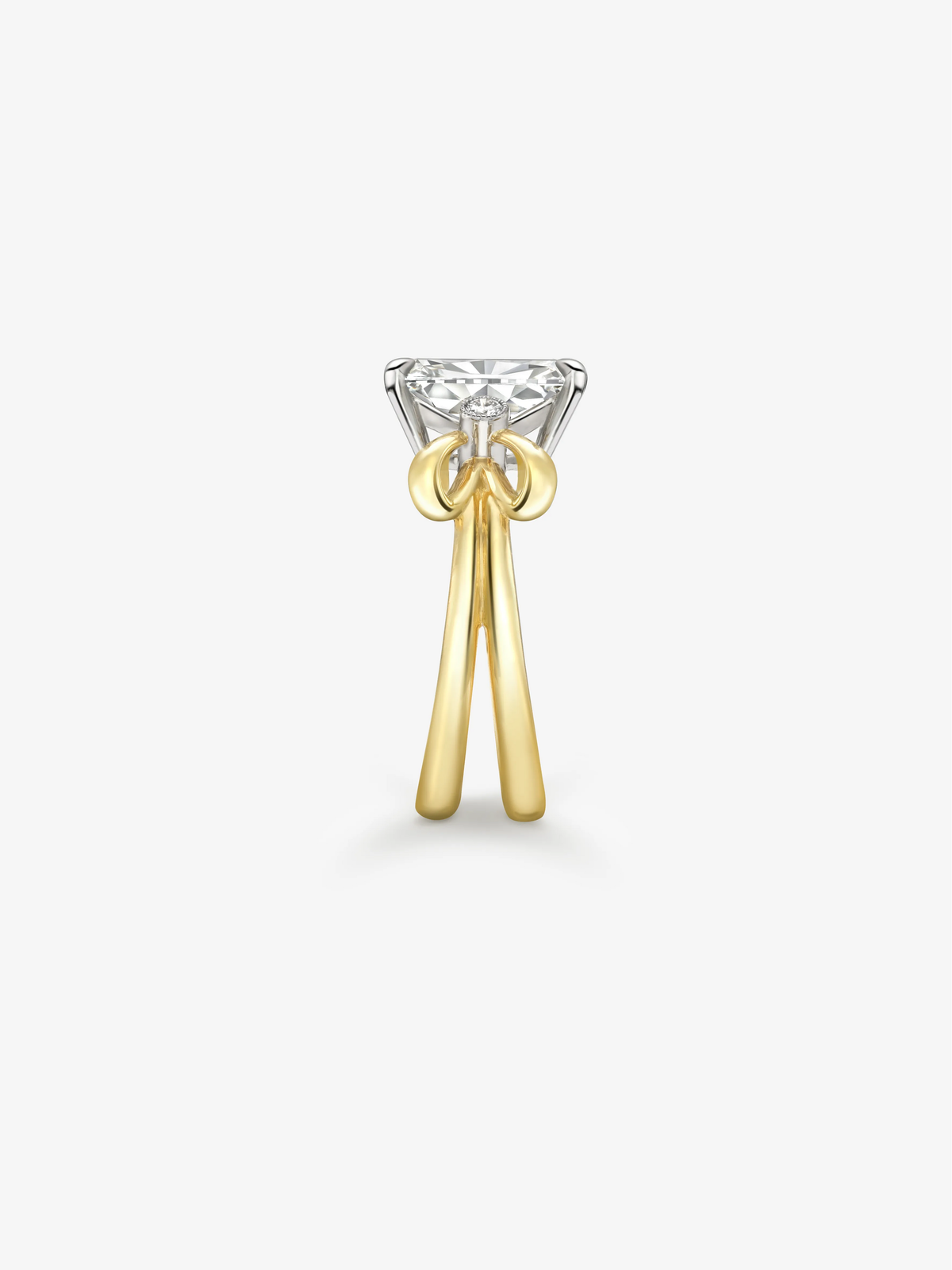 Jessica McCormack cushion cut diamond ring with a sculptural gold bow-inspired band and contrasting white metal setting, showcasing contemporary antique-inspired craftsmanship View 4