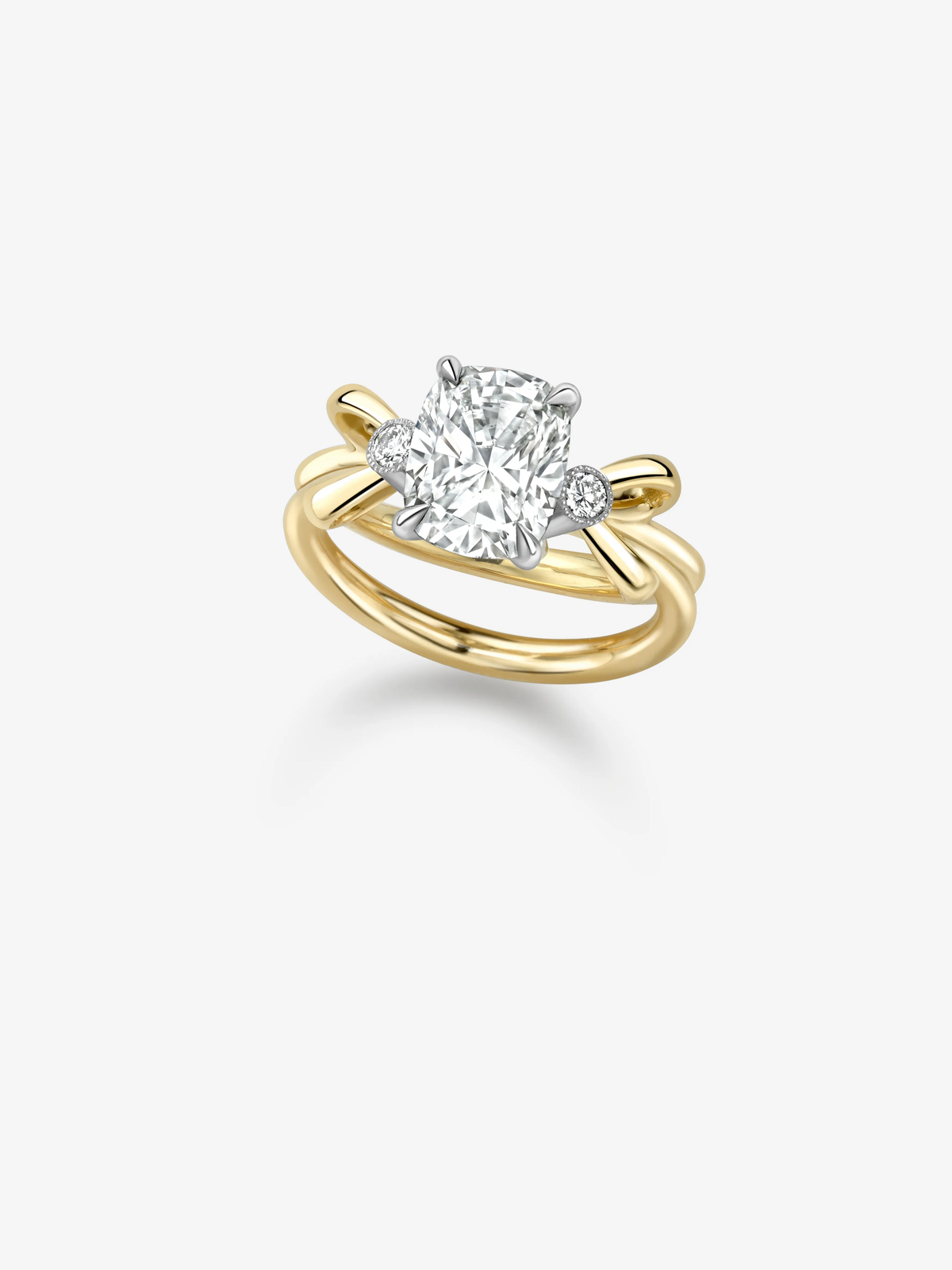 Cushion cut diamond ring with a 2.21ct centre stone, round diamond accents and intertwined yellow gold bands in a bow-inspired design View 2