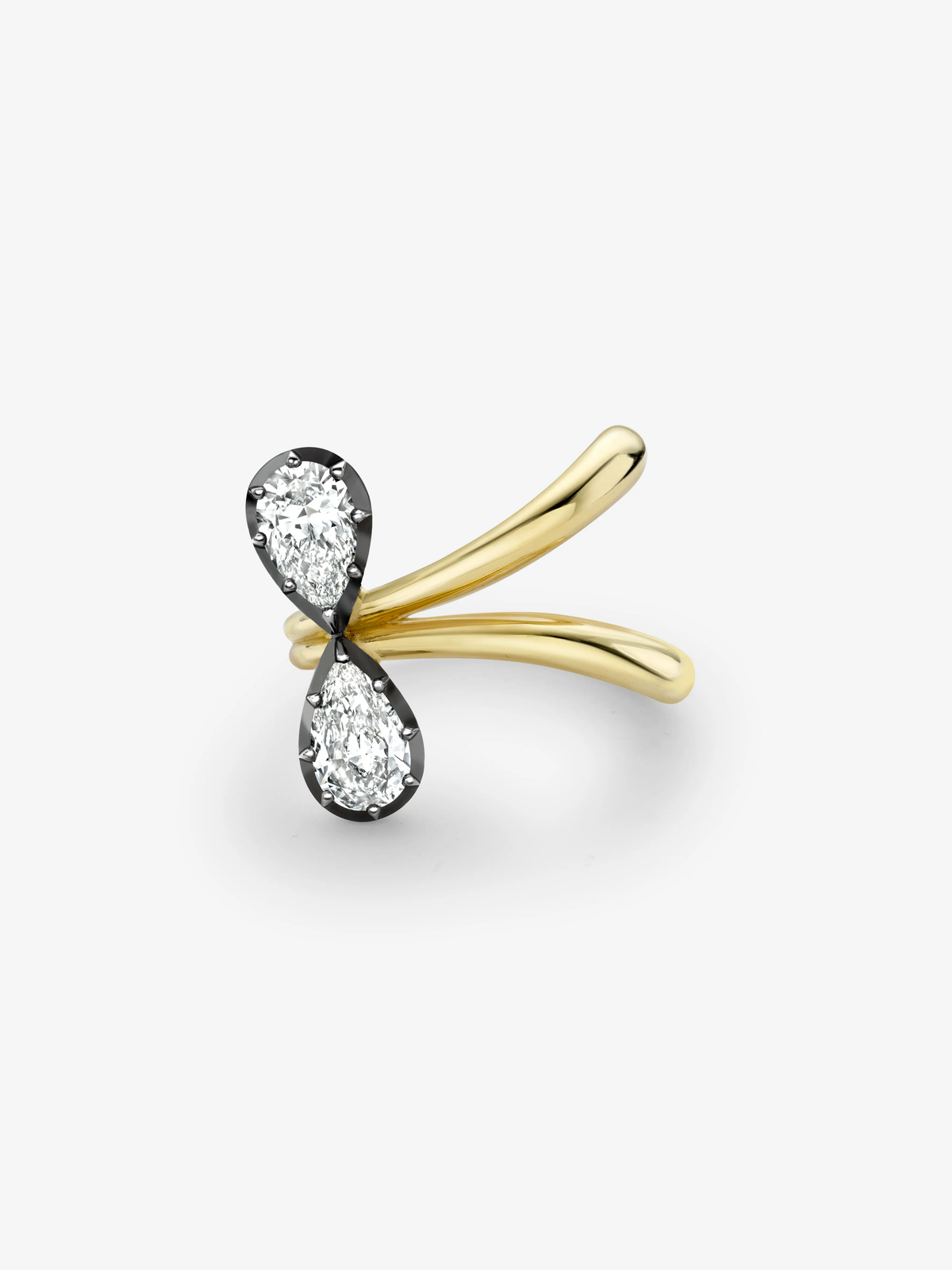 Jessica McCormack ring with two pear shaped diamonds in a blackened gold setting and sculptural yellow gold bands, blending antique inspired design with contemporary style View 1