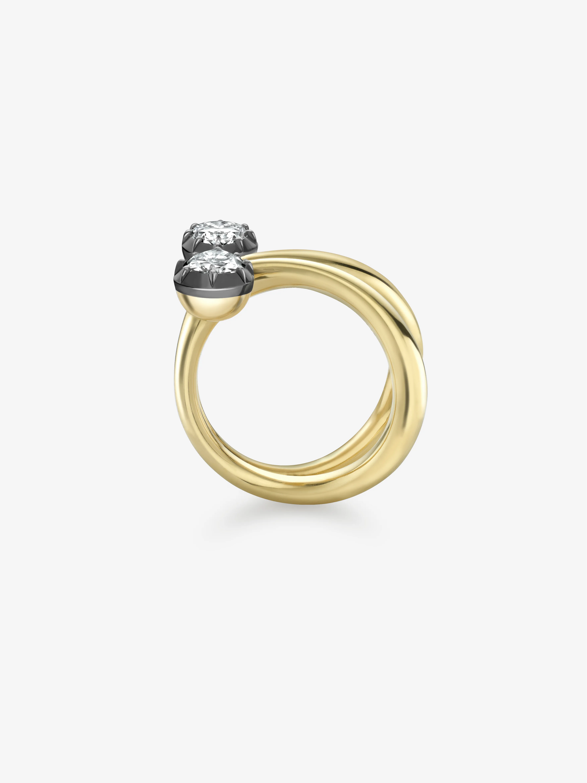 Jessica McCormack ring with a polished gold band, blackened gold bow setting and pear shaped diamond View 4