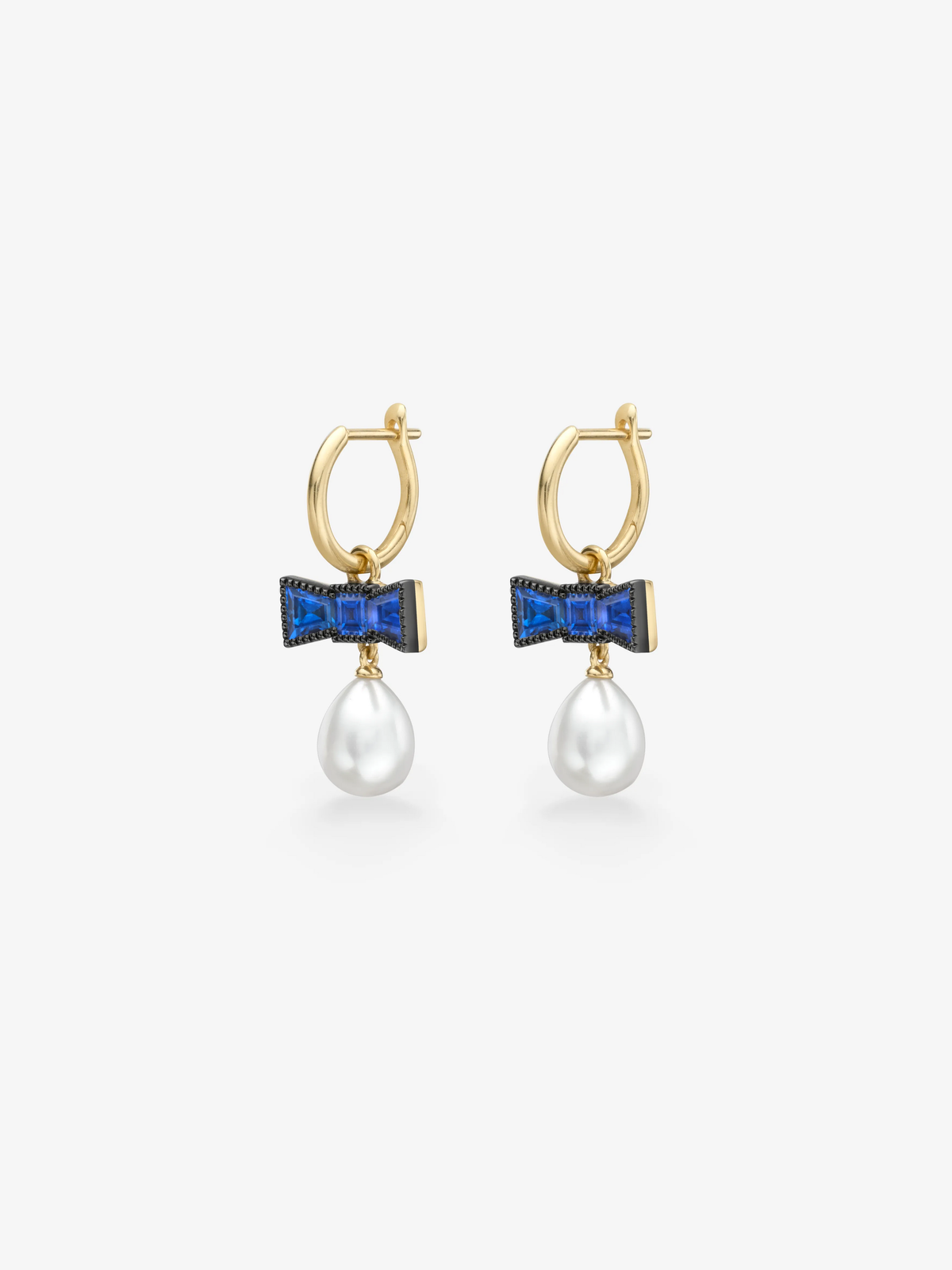 Jessica McCormack gold hoop earrings with blue sapphire bow details and dangling white pearls, combining antique-inspired character with contemporary style View 2