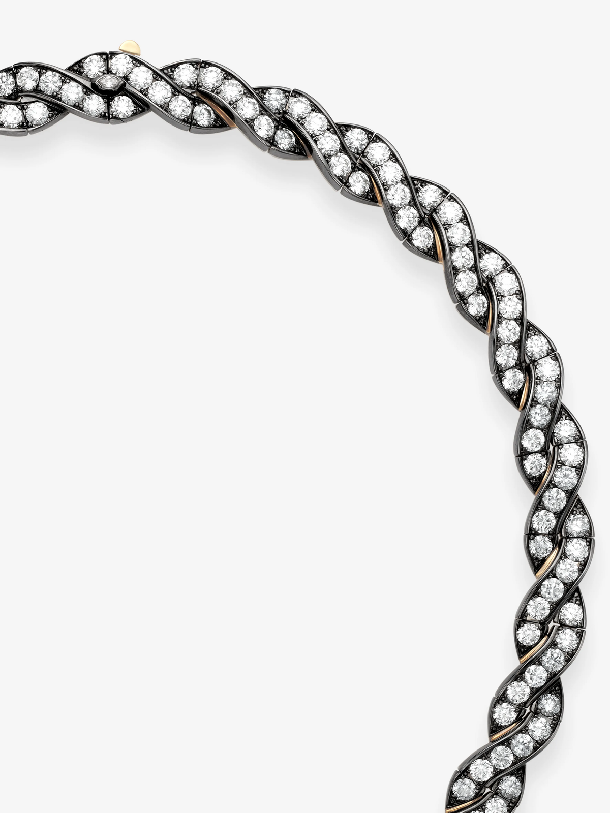 Close-up of a diamond and blackened gold necklace with intertwined ribbon-like strands, showcasing contemporary style and traditional craft techniques View 4