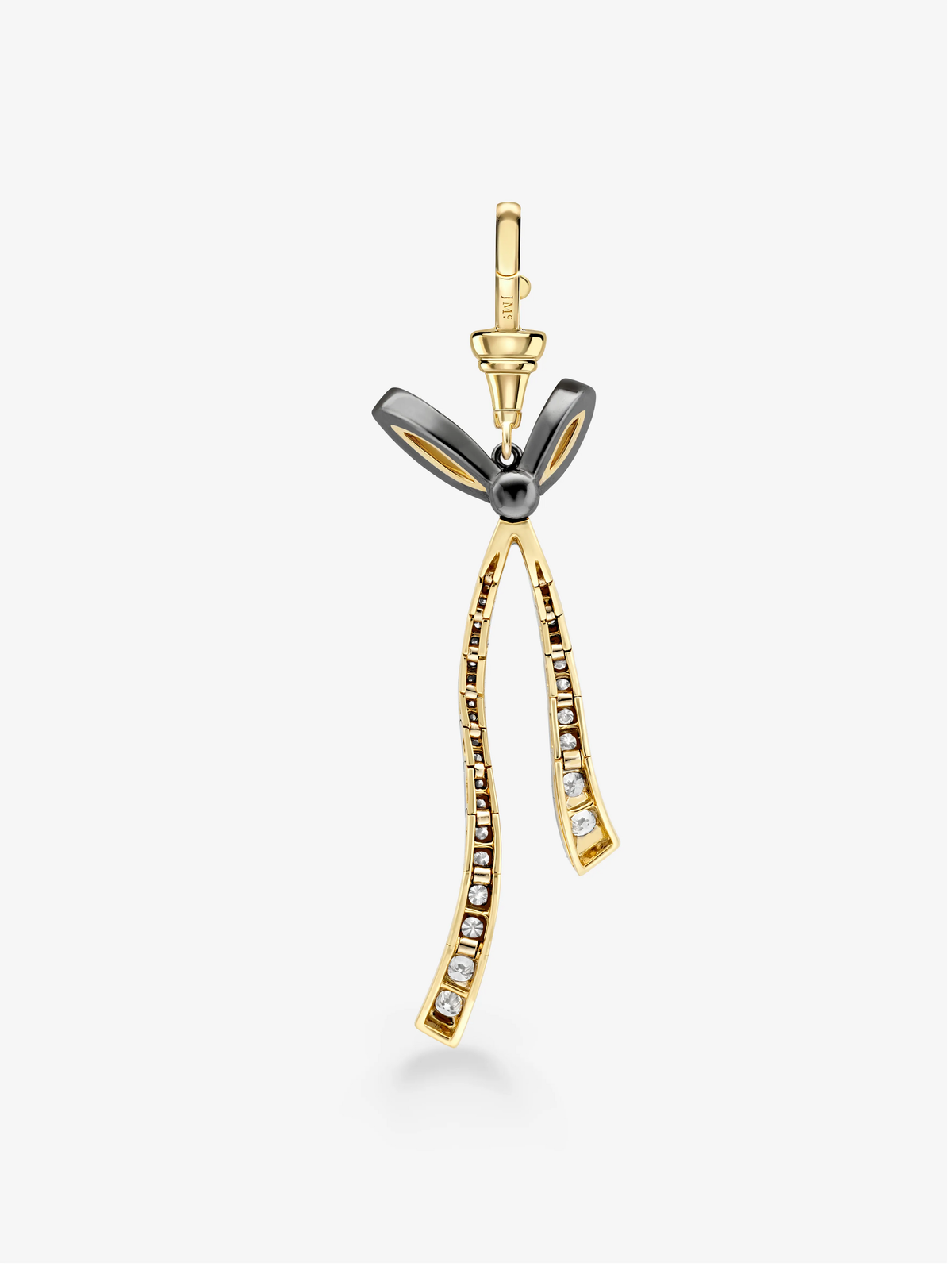 Jessica McCormack diamond bow pendant in gold and blackened gold, with diamond set ribbon tails and a detachable ball and chain detail. View 4