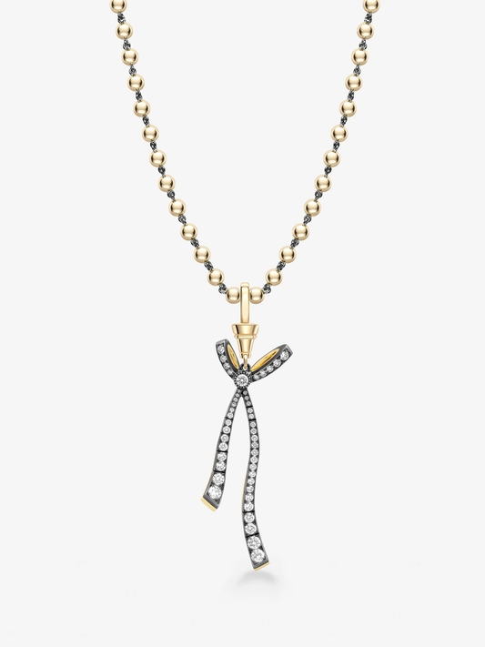 Jessica McCormack diamond ribbon pendant necklace on a two-tone ball chain, featuring a bow-shaped design with elongated diamond-set tails View 2