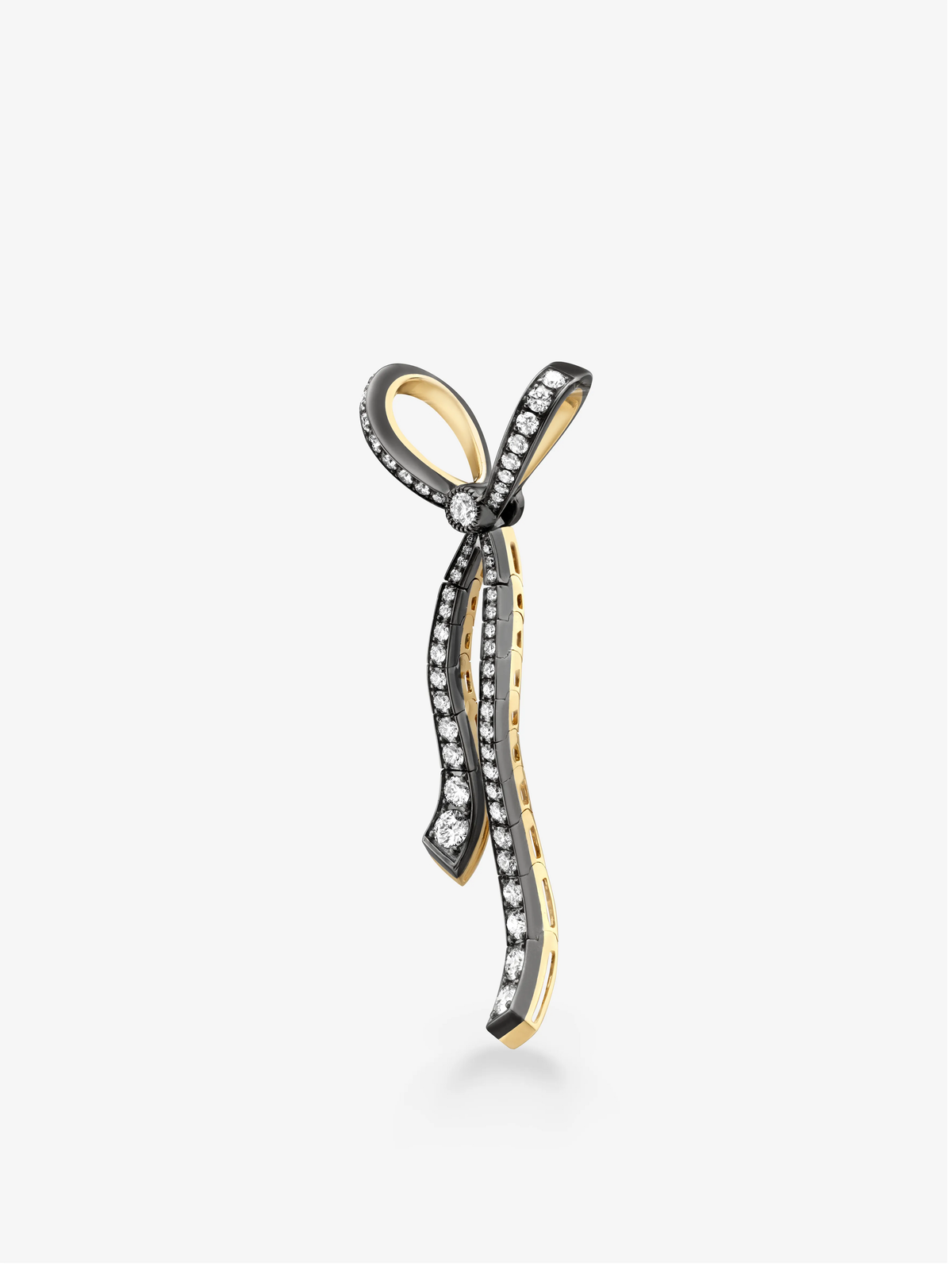 Jessica McCormack diamond bow pendant with a sculptural ribbon design in contrasting blackened white and yellow gold, showcasing contemporary craftsmanship View 4