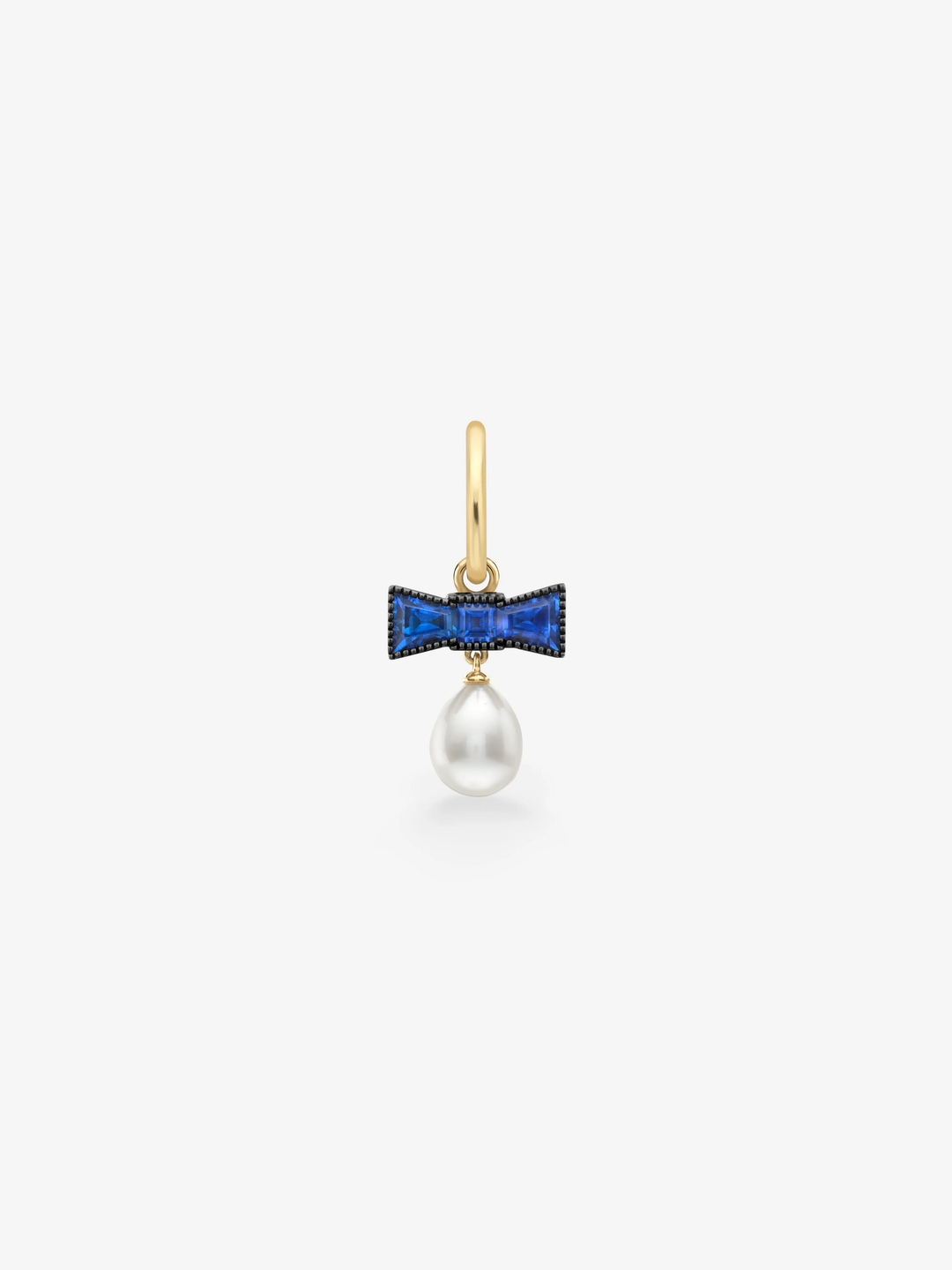 Single gold hoop earring with a blue sapphire bow motif and a lustrous pearl drop, blending antique-inspired detail with contemporary style  View 1