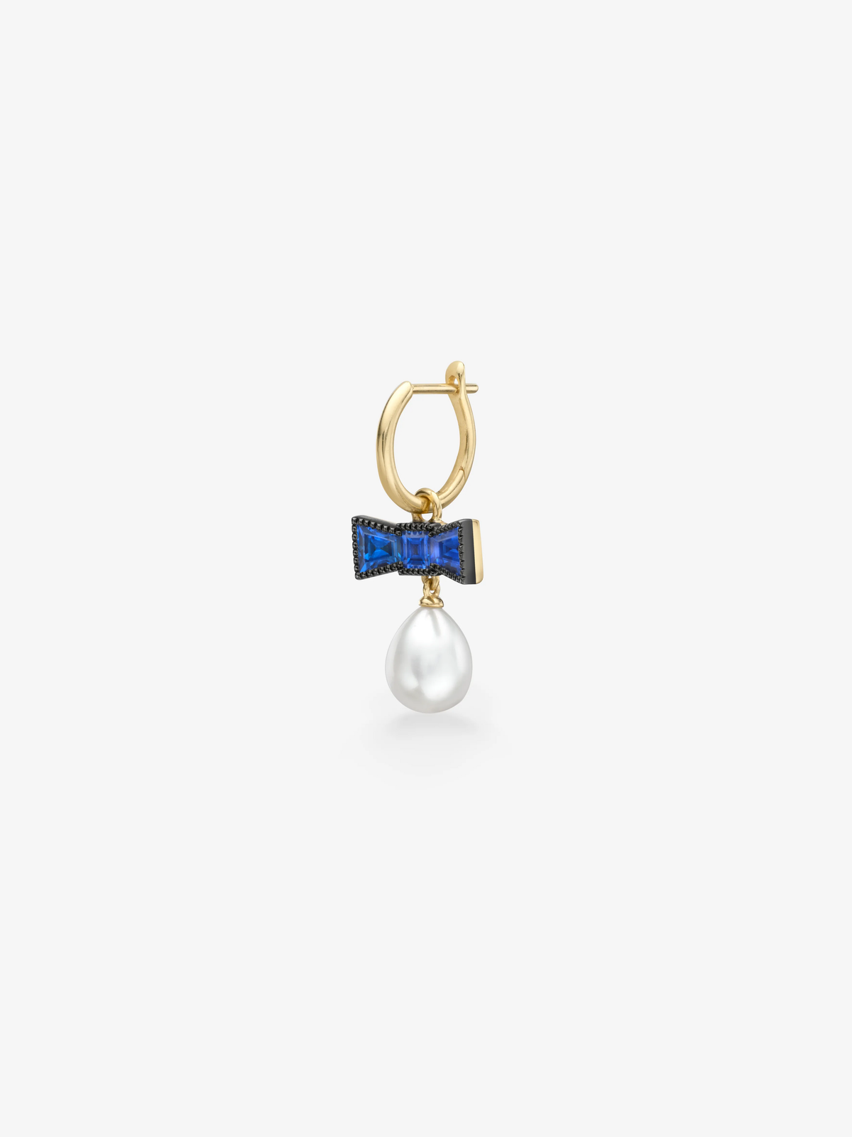 Single gold hoop earring with a vivid blue sapphire bow motif and lustrous pearl drop, showcasing contemporary gypset style and refined craftsmanship View 2
