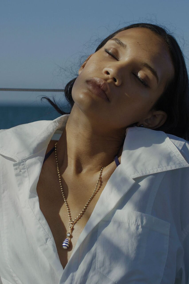 Model wears the Breton Stripe Pearl Pendant