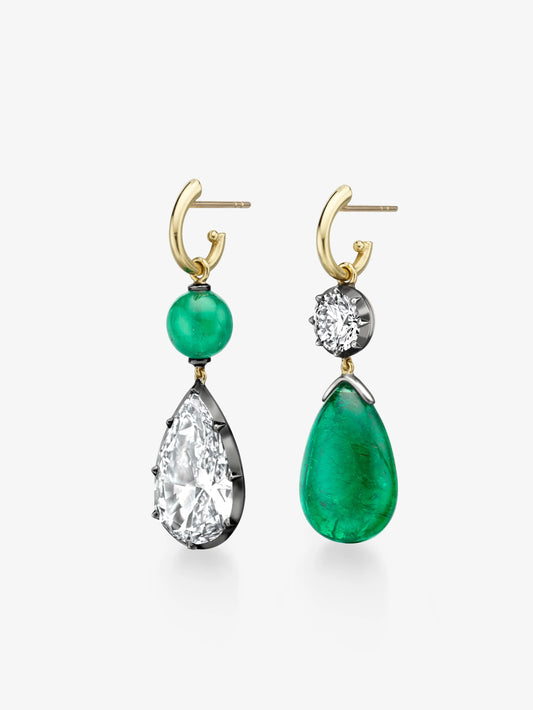 Pair of asymmetric hoop earrings featuring cabochon emerald and pear-shaped diamond drops, set in yellow gold with hand-crafted antique-inspired detailing. View 2
