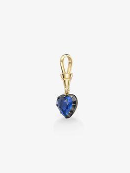 Heart-shaped deep blue sapphire pendant set in polished yellow gold, combining antique-inspired artistry with contemporary design.