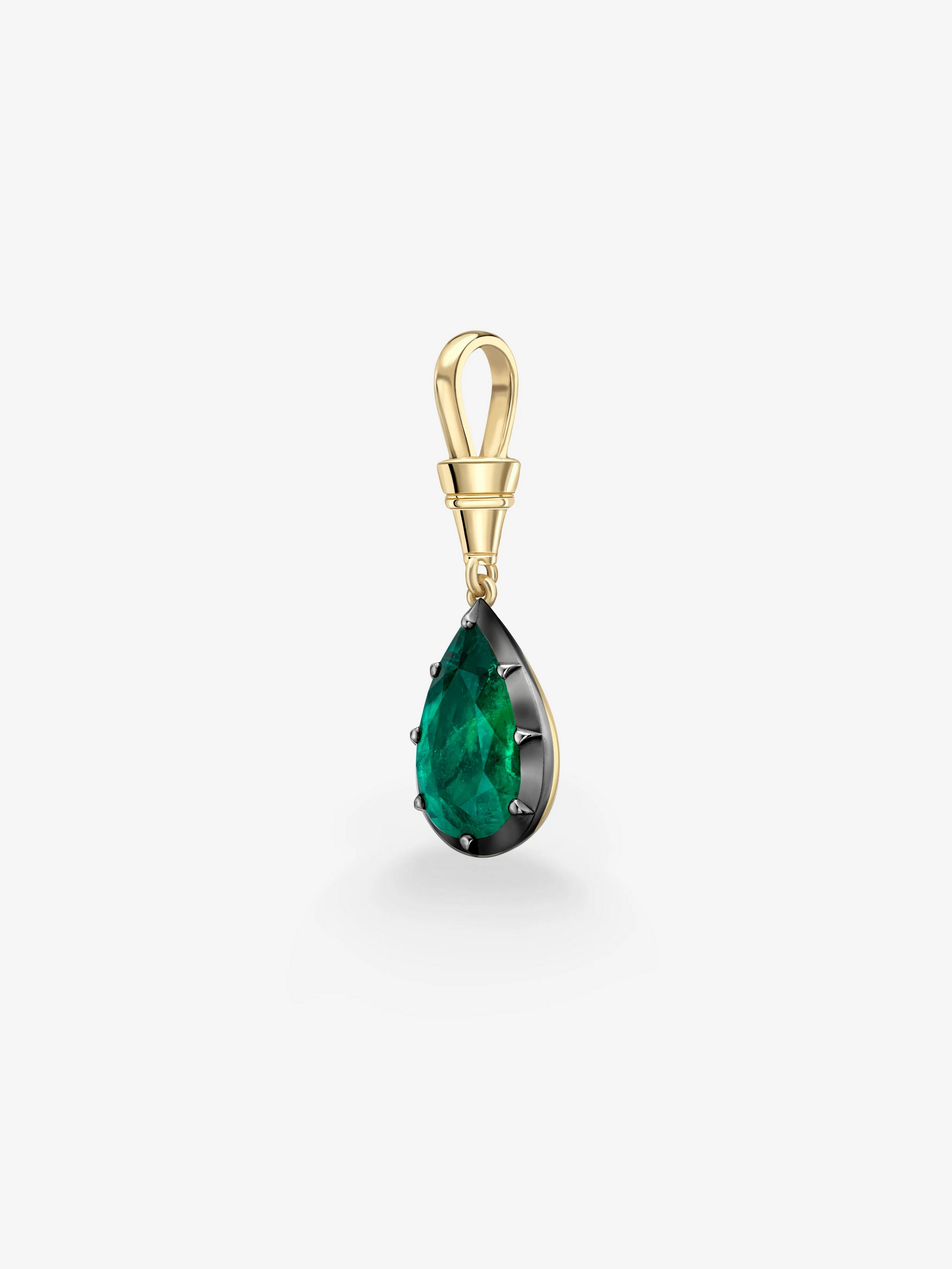 Pear-shaped deep green emerald pendant set in hand-crafted yellow gold with blackened gold details, blending antique craftsmanship with contemporary design. View 4
