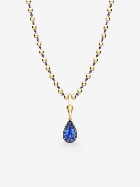 Jessica McCormack Ball n Chain necklace with a 5.42ct pear shaped blue sapphire pendant and alternating polished gold bead chain View 2