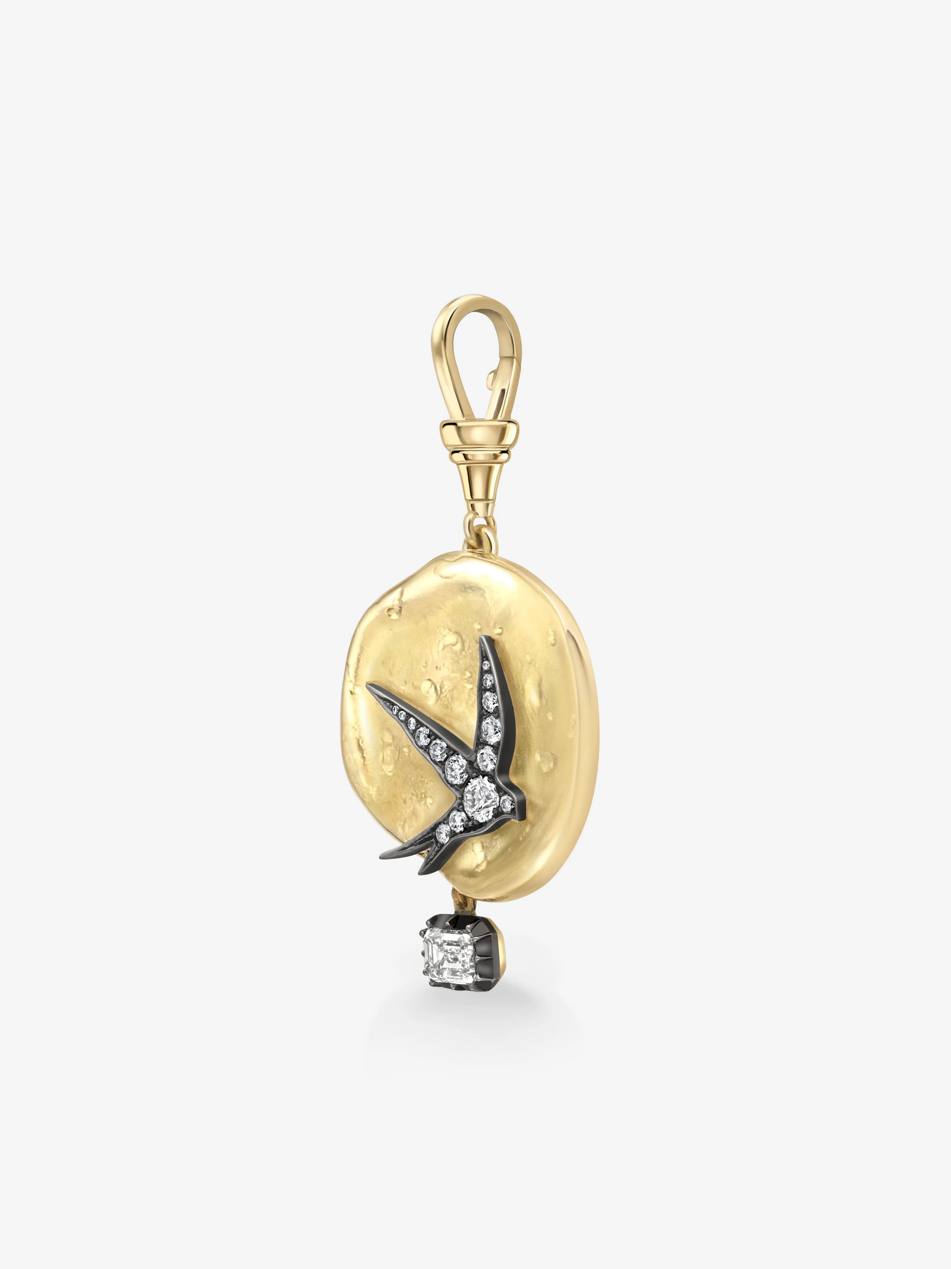 Gold pendant with a bird design on a white background View 4