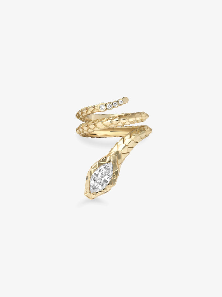 Jessica McCormack Golden Snake ring in textured yellow gold with a marquise-shaped diamond.